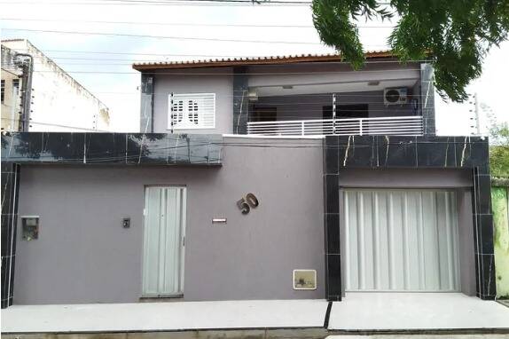 Casa à venda com 5 quartos, 210m² - Foto 1